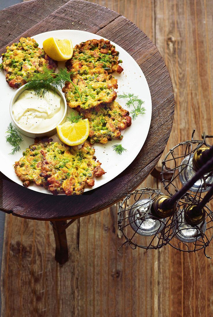 Pea, zucchini and halloumi fritters