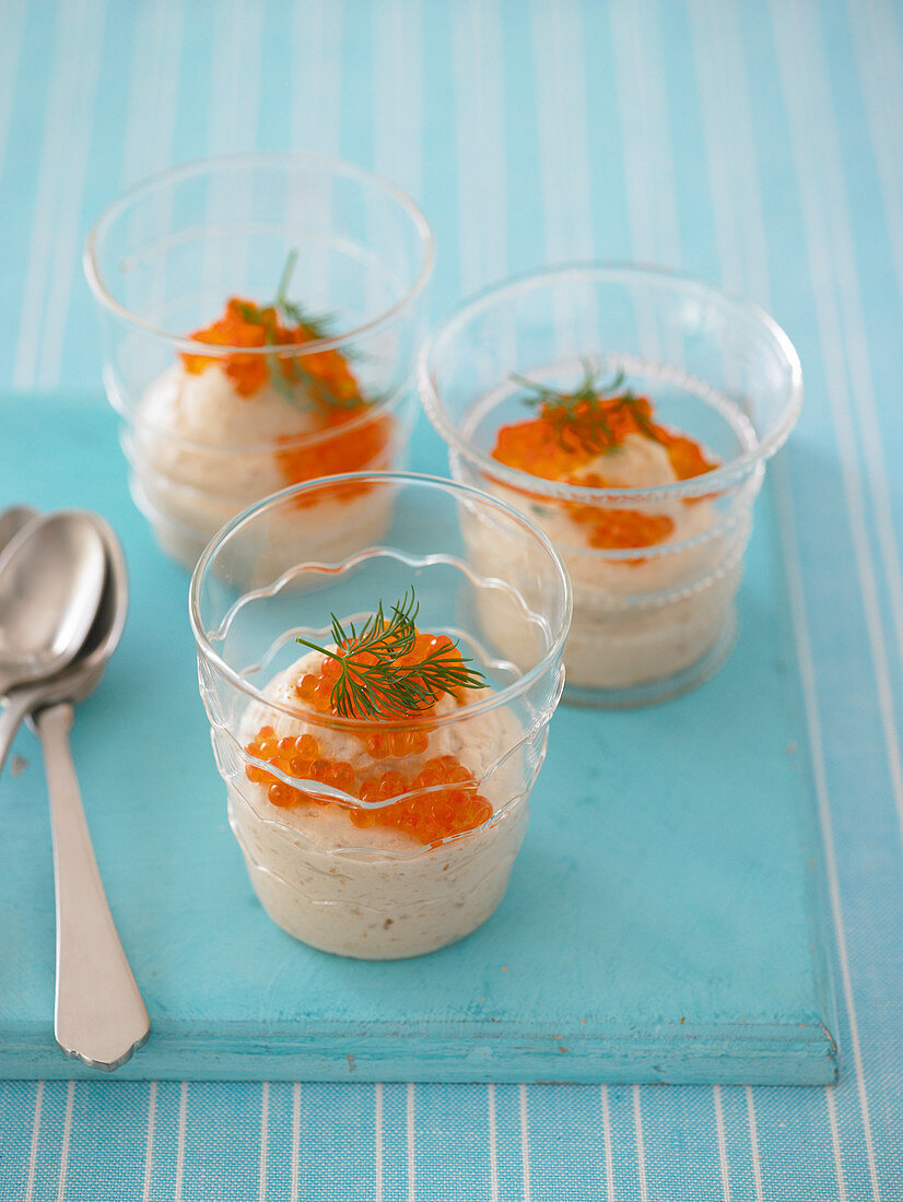 Salmon mousse with salmon caviar served in glasses