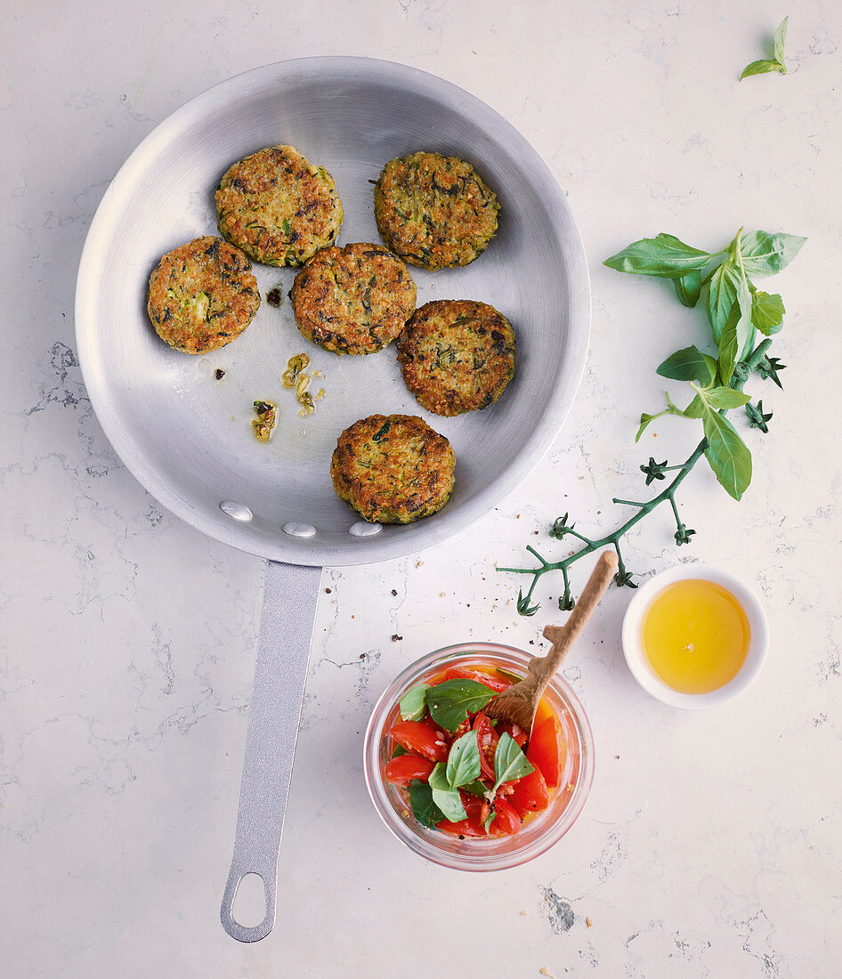 Spelt and courgette fritters with a tomato and honey dip