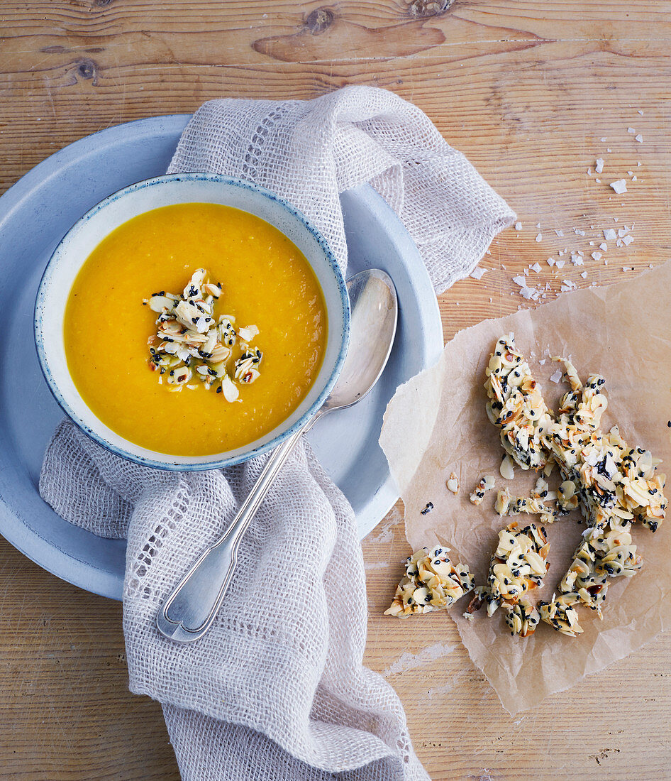 Pumpkin soup with crispy almond bars