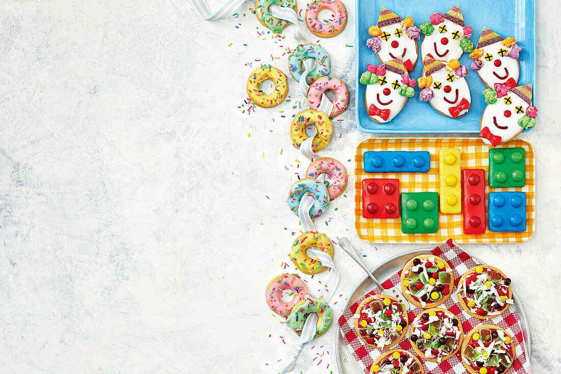 Mini doughnut cookies, pizza biscuits, lego biscuits and clown biscuits