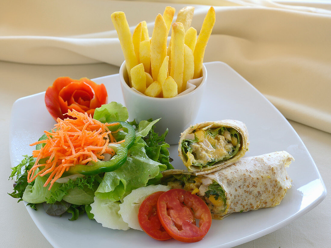 Wraps with a side salad and french fries