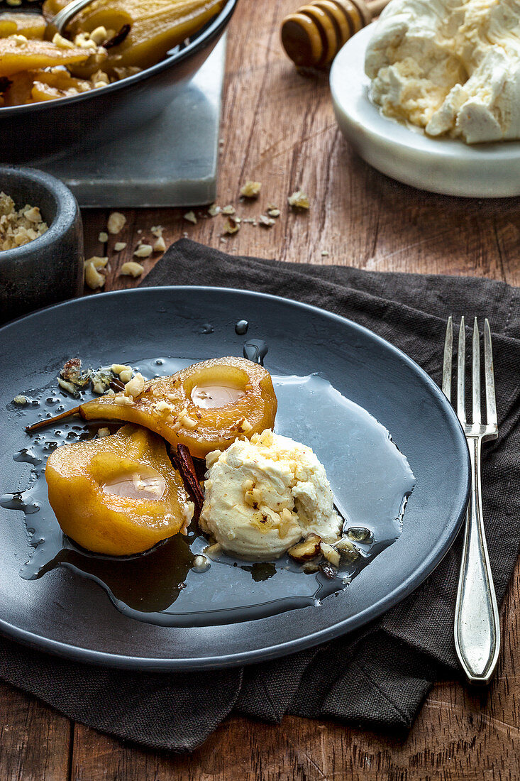 Roast pears with honey labne and candied hazelnuts