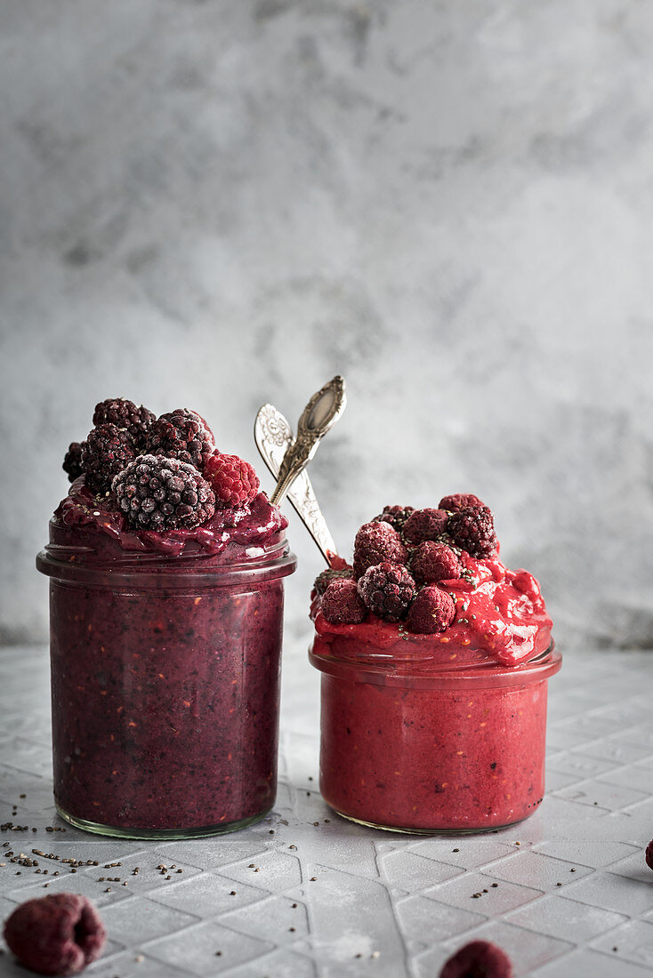 Frozen berry smoothies with bananas, chia seeds and almond milk