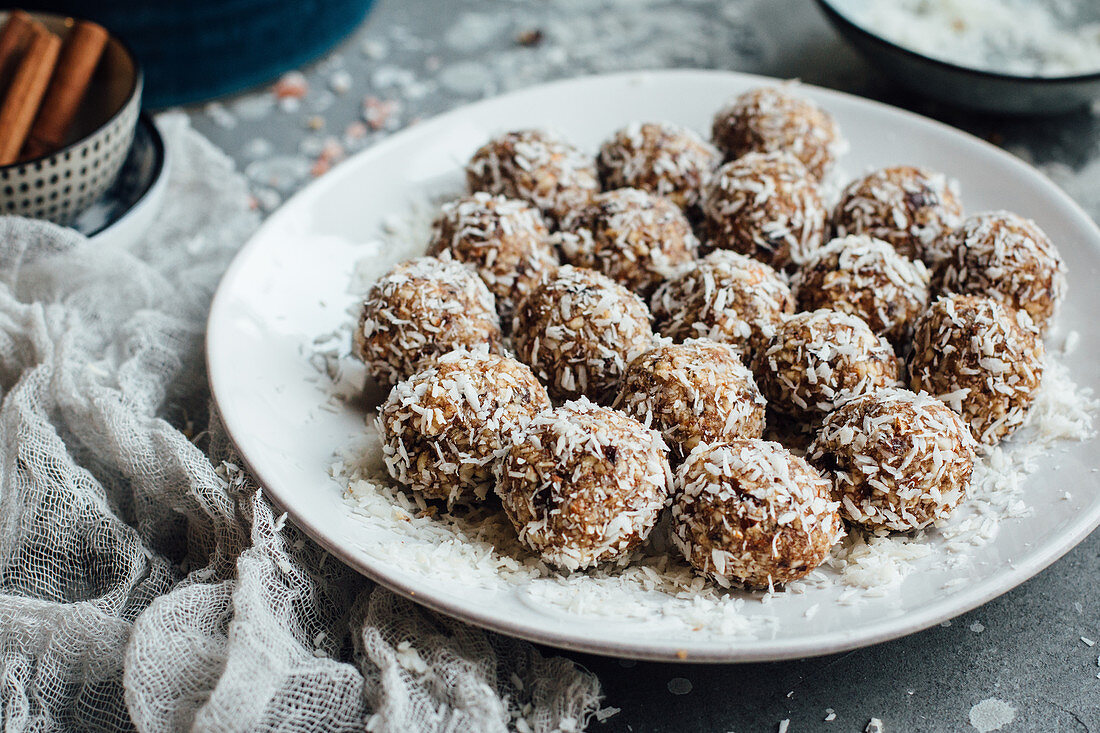 Almond and date energy balls with grated coconut