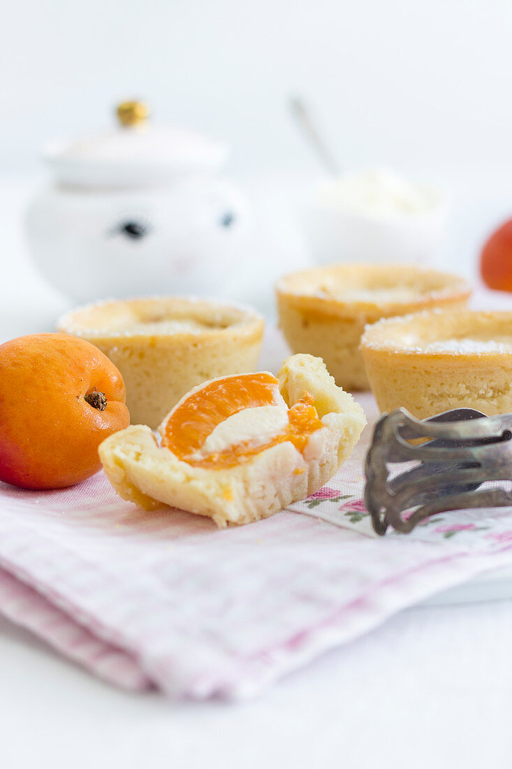 Summer muffins with an apricot and mascarpone filling