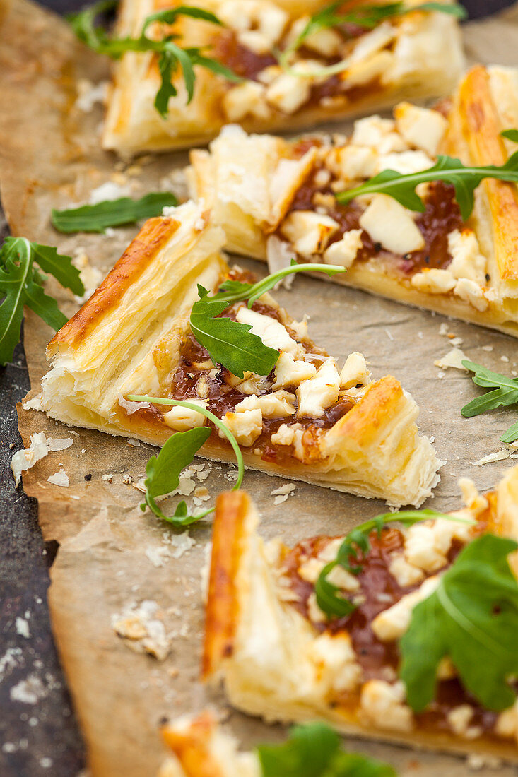 Savory puff pastry slices with caramelised onions and goat's cheese