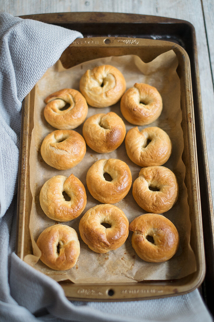 Mini bagels on a baking tray