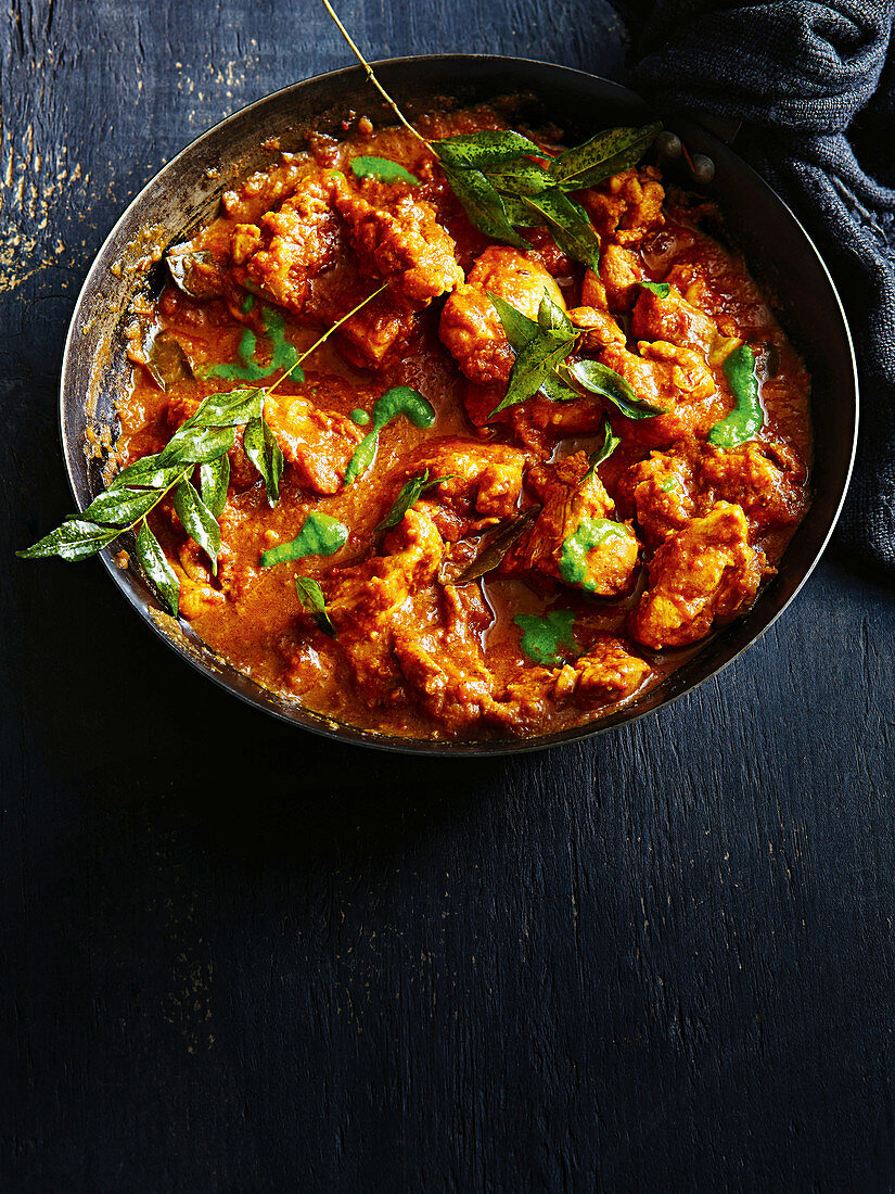 Tomato and tamarind chicken curry