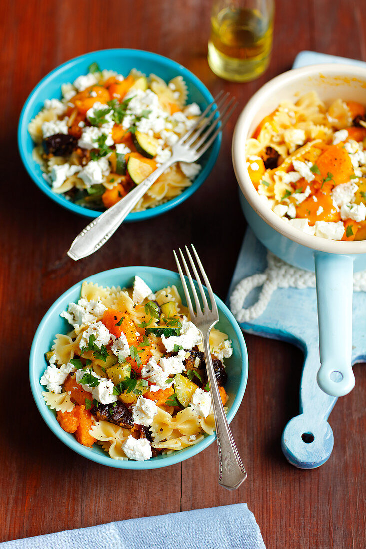 Farfalle with pumpkin, courgette, prunes and feta