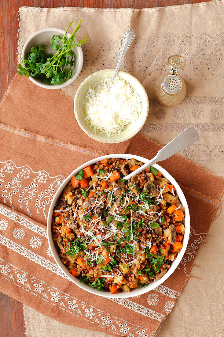 Buckwheat with mushrooms, carrot and parmesan