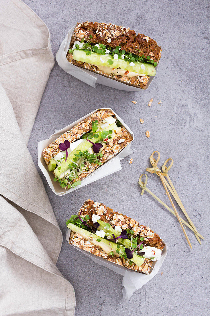 Sandwiches with cucumber, feta cheese and hummus