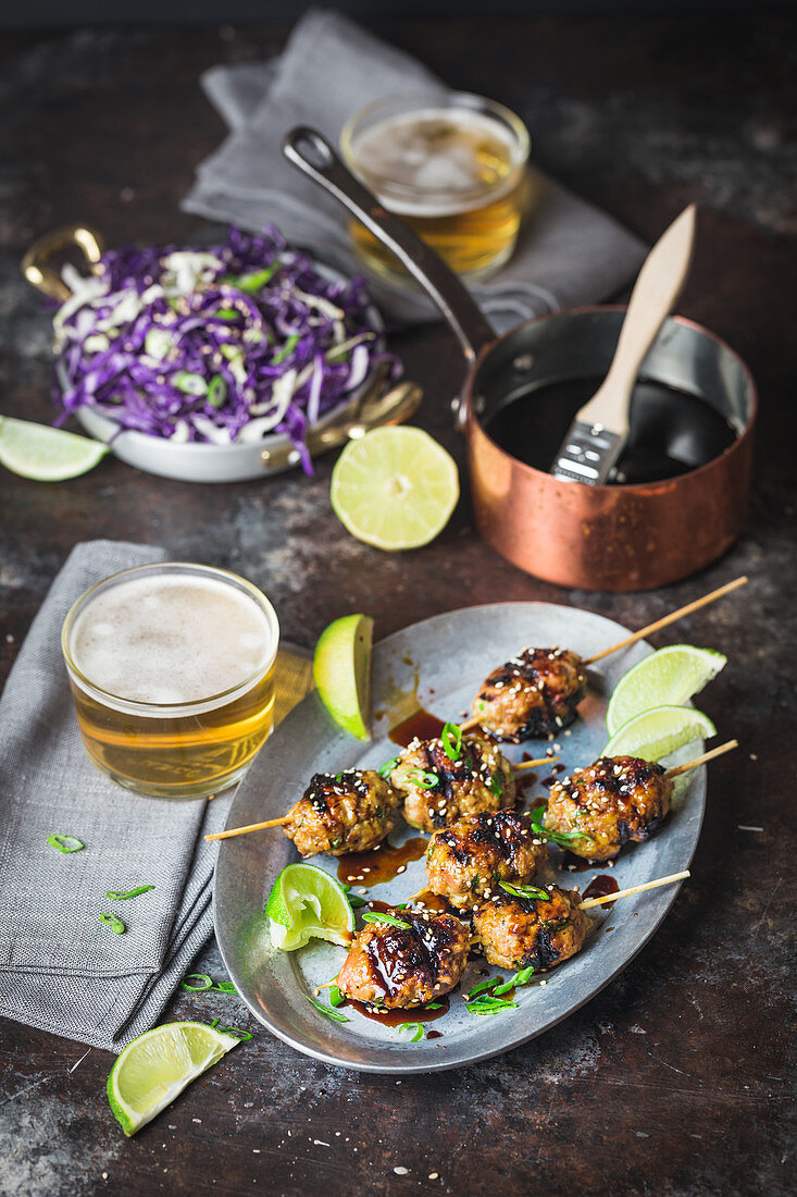 Asian Chicken Meatballs on Skewers with Cabbage Salad