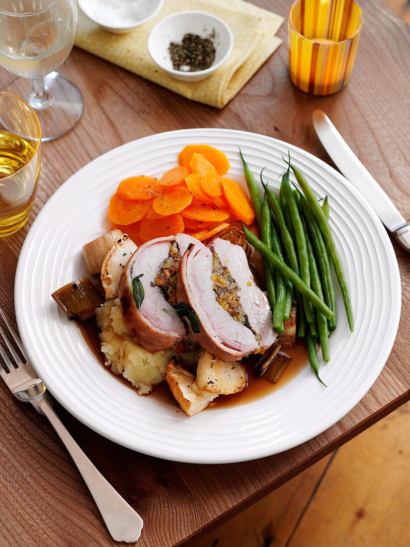 Roast pork with vegetables and potatoes