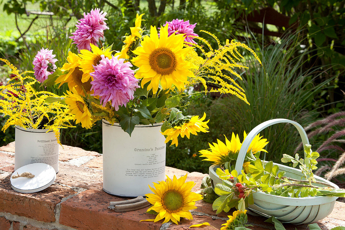 Rural bouquets with dahlias, sunflowers and goldenrod