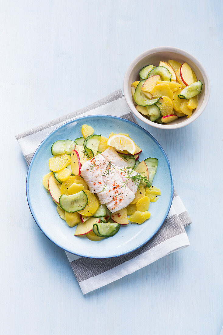 Steamed cod with potato and cucumber salad
