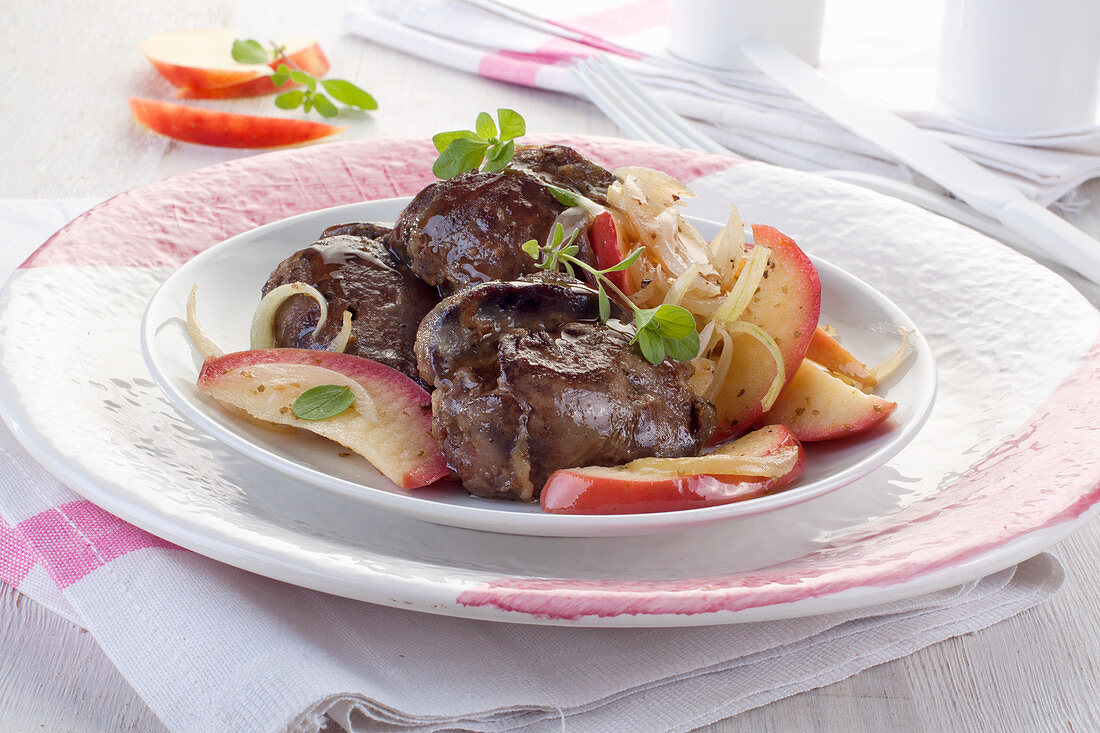 Fried chicken liver with apple onion and marjoram