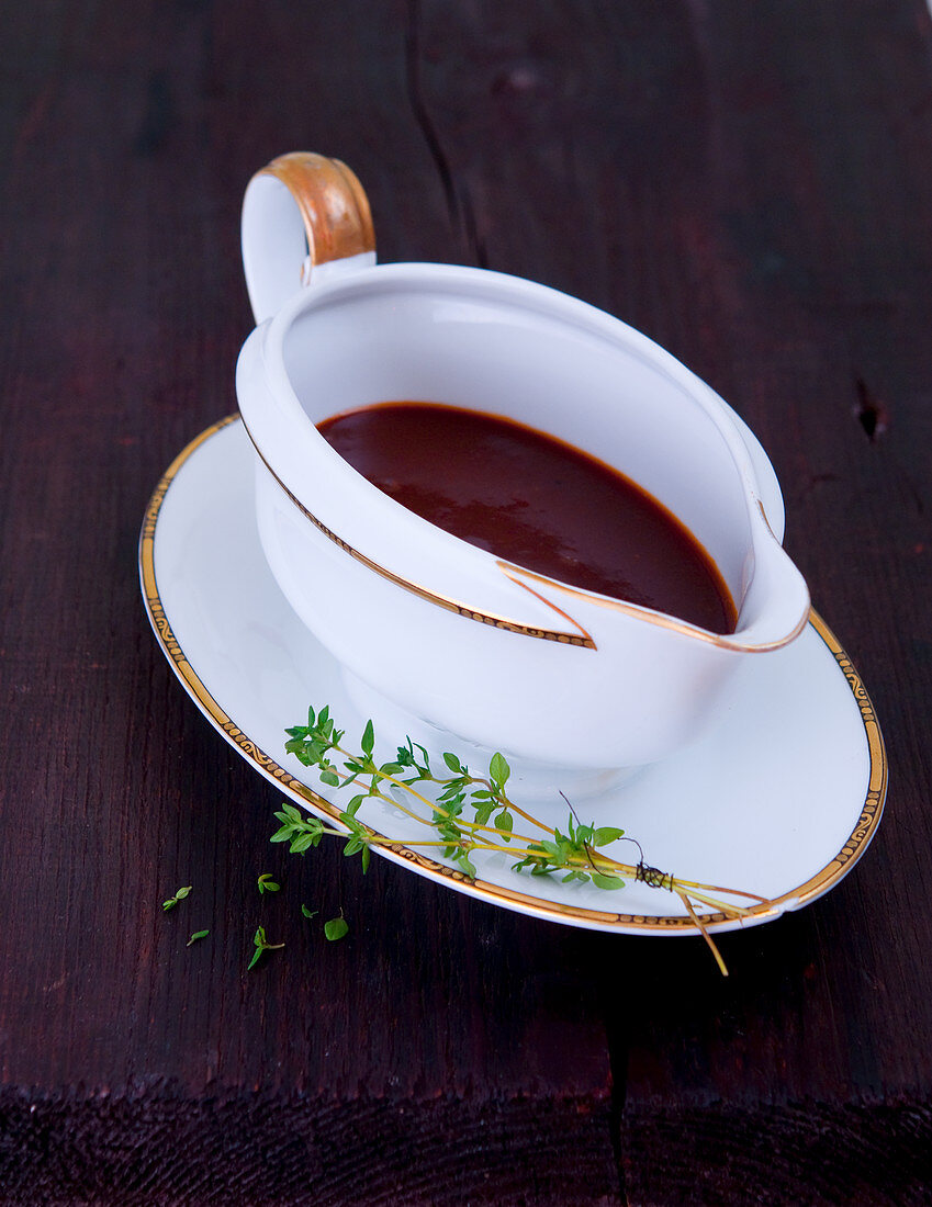 Thyme jus in a gravy boat