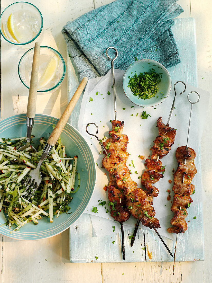 Beef satay skewers with a herby apple and celery salad