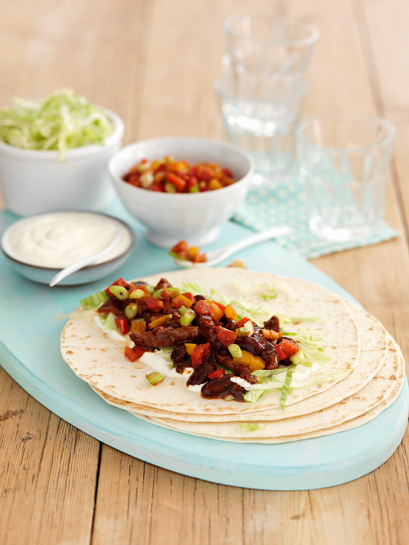 Mexican beef fajitas with sour cream