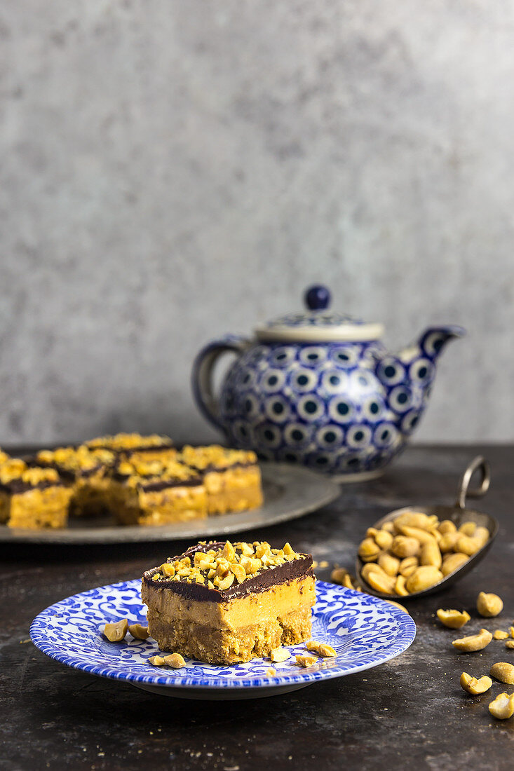 Peanut butter and chocolate slices served with tea