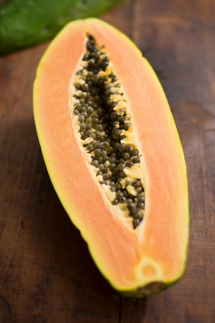 Sliced papaya with seeds