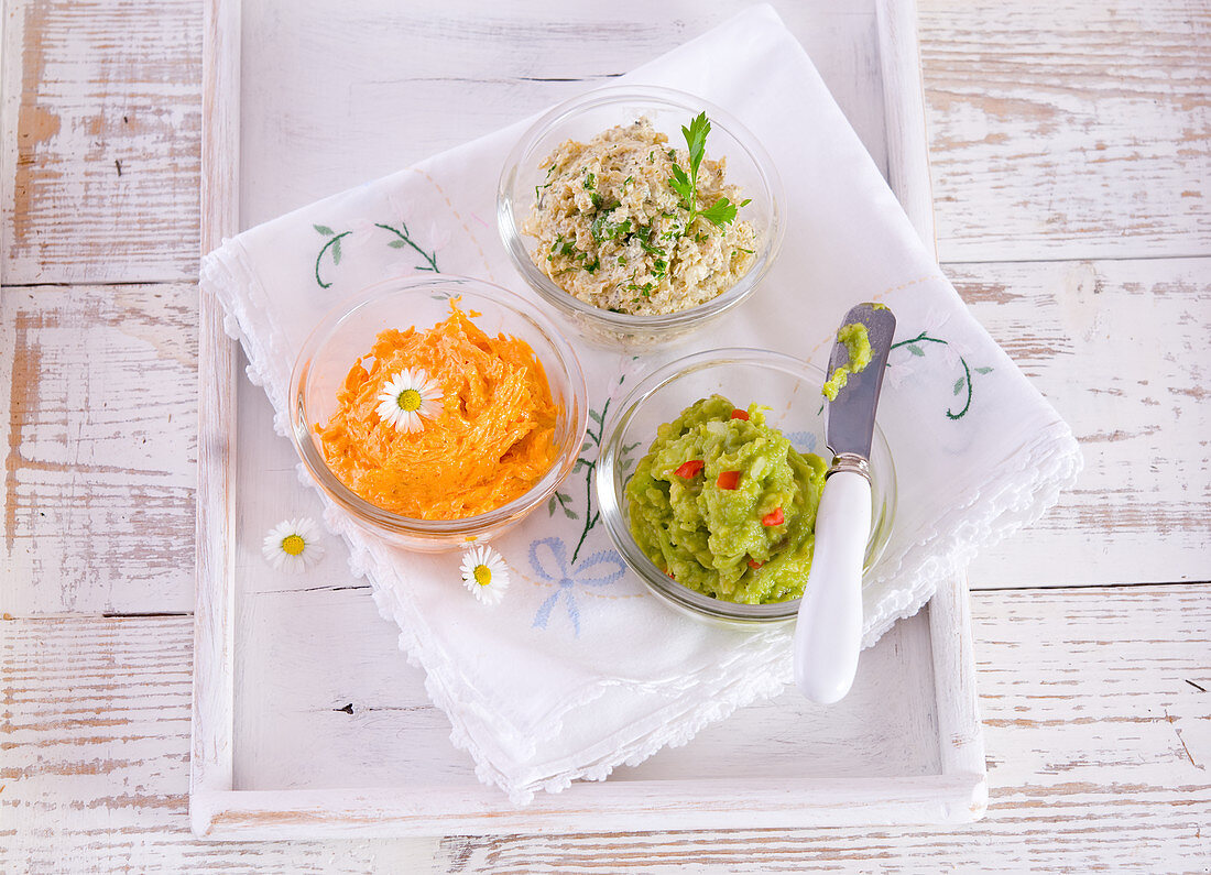 Carrot butter, guacamole and parsley-freekeh spread