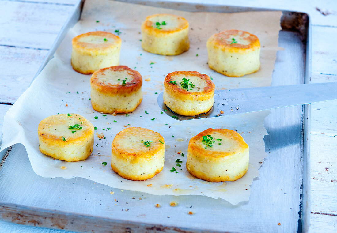 Potato cakes on a baking tray