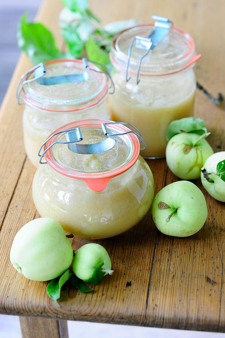 Homemade applesauce in preserving jars