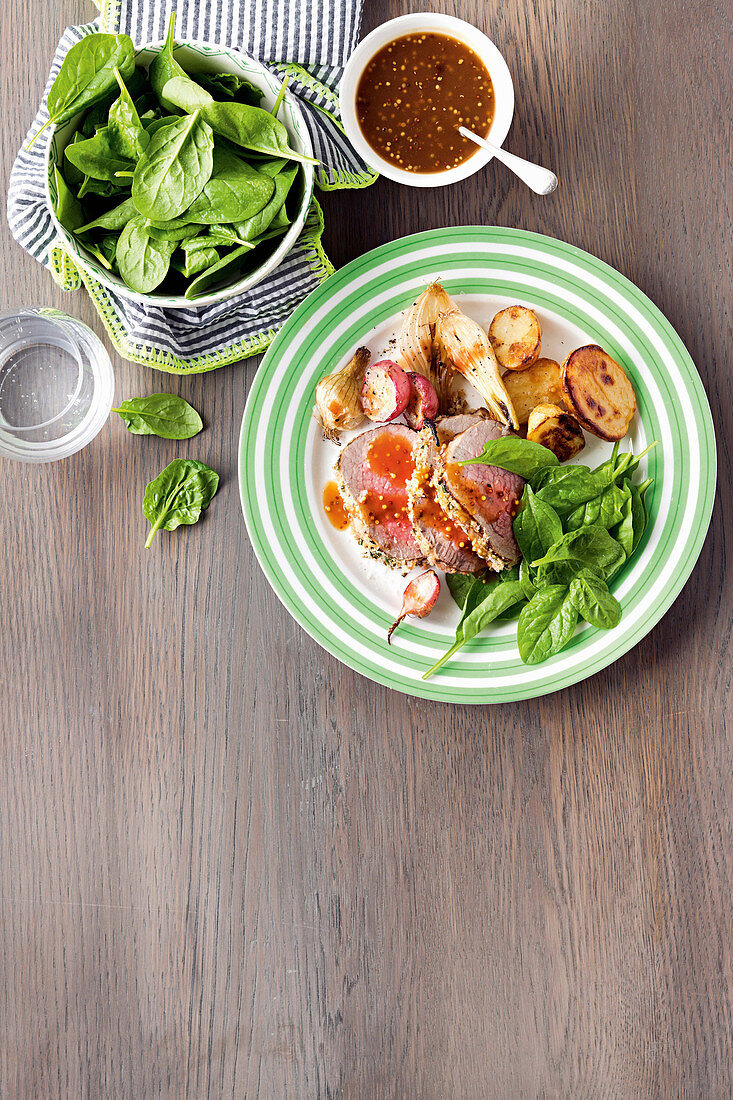 Herb-crusted beef with sweet roasted radish