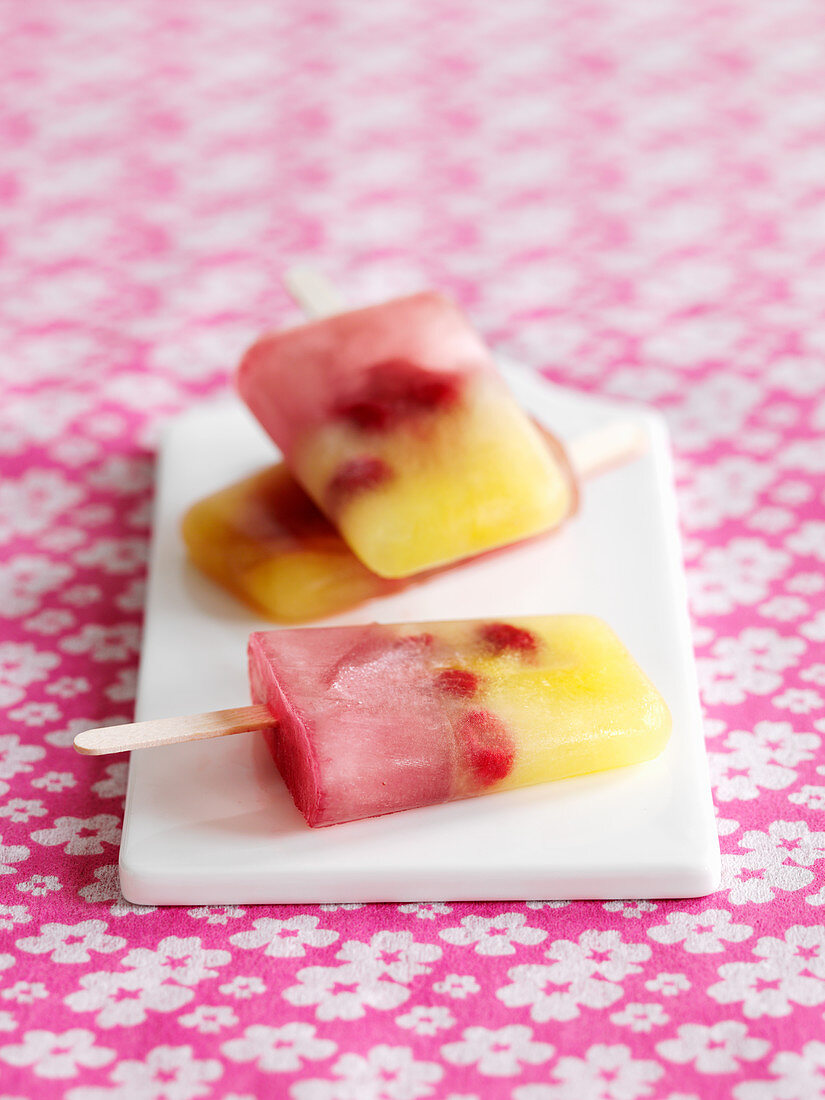 Homemade fruit ice lollies on a stick