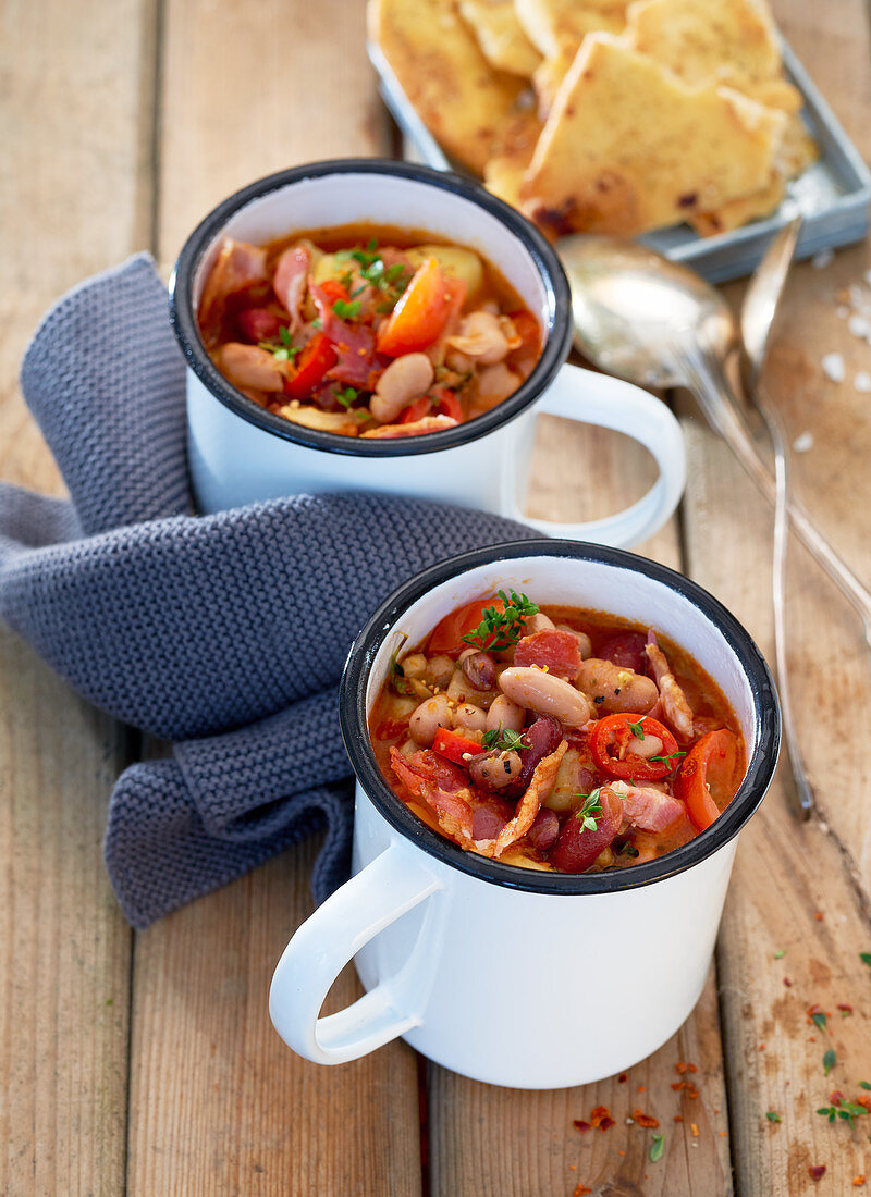 Twp tin mugs with bean soup