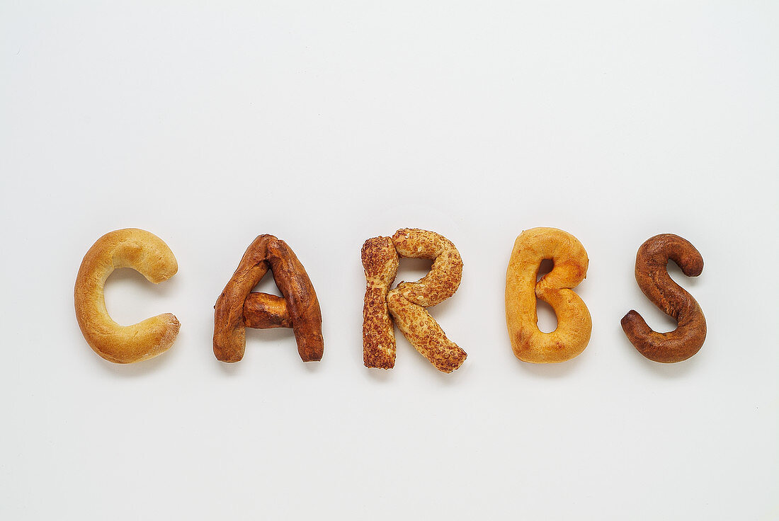 Carbs spelled out with bread basket goodies