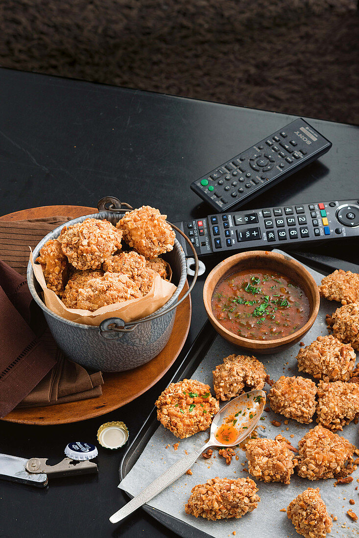 Peanut and pretzel chicken with bloody Mary dipping sauce