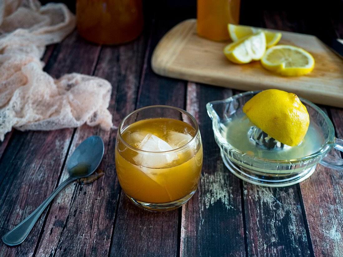 Weight loss drink with ginger, apple vinegar, syrup and lemon
