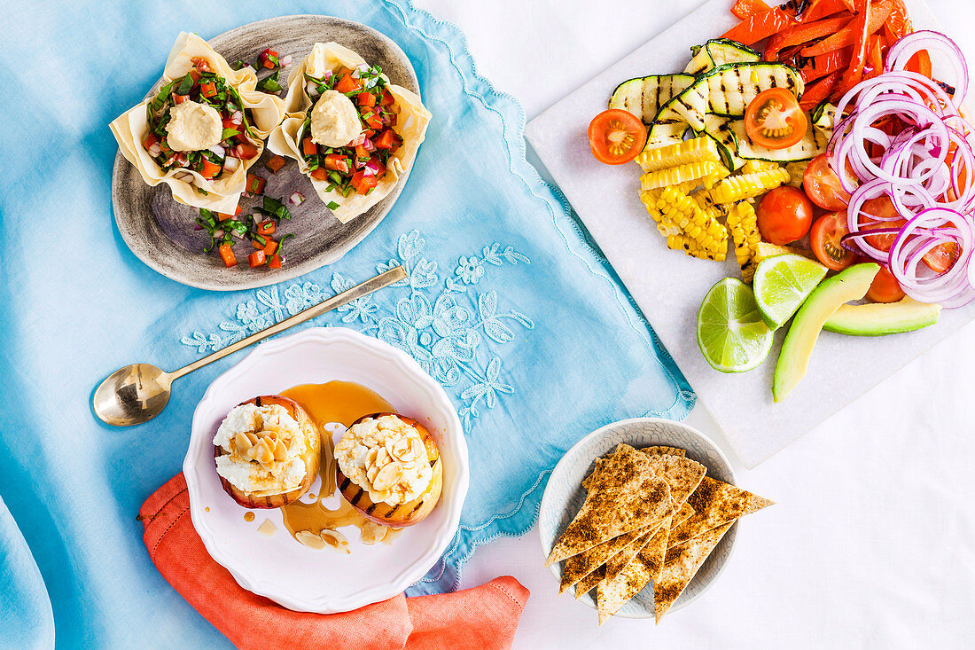 Vegeterian taco plate, humus cups and grilled ricotta nectarines