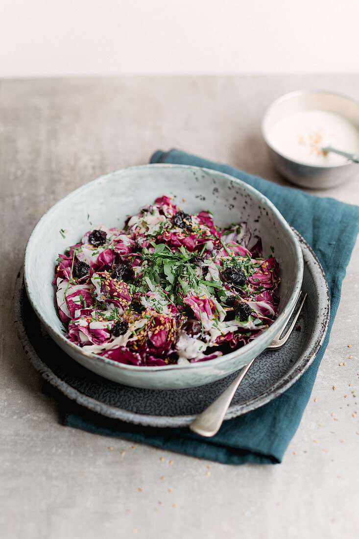 Radicchio salad with a tahini dressing a dried sour cherries