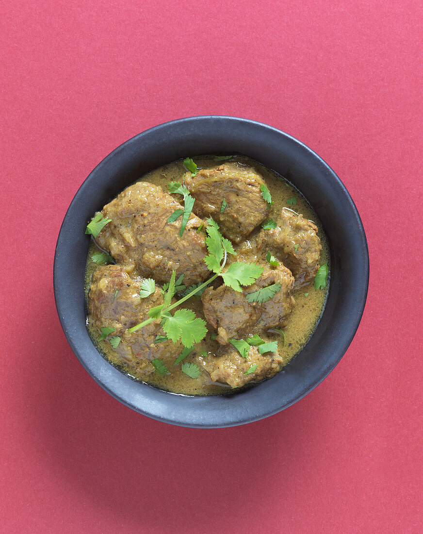 Lamb and coconut curry with coconut milk and coriander