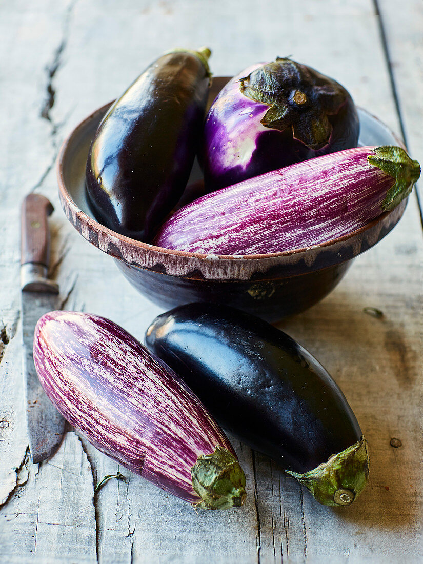 Still life with various types of aubergines