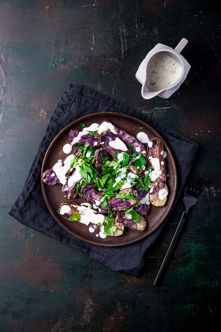 Blue potato and parsley salad with yoghurt dressing