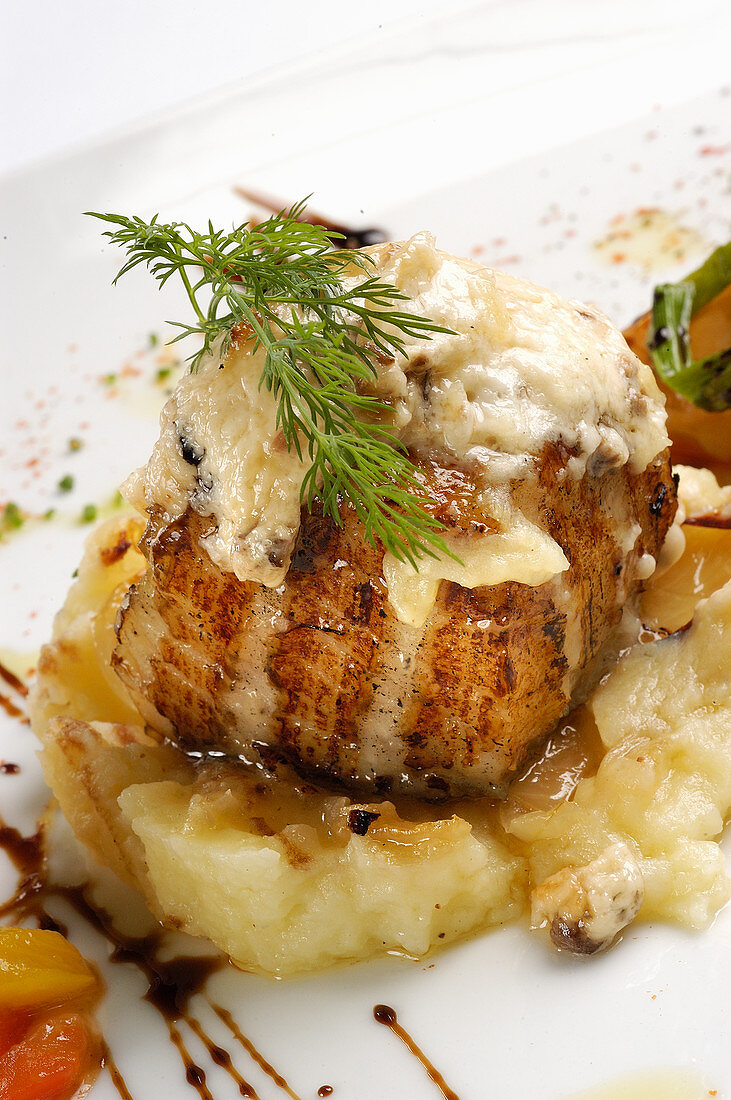 Bacalhau (dried, salted cod) with Serra cheese (Portugal)