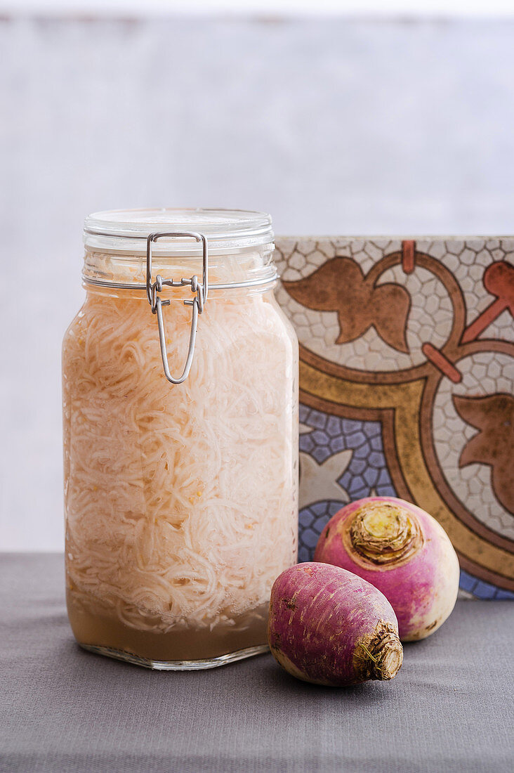 A jar of lacto-fermented turnips