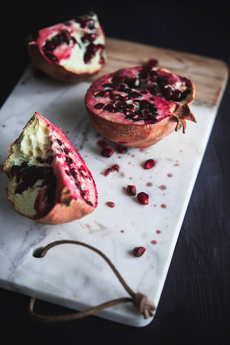 Pomegranate on A Chopping Board