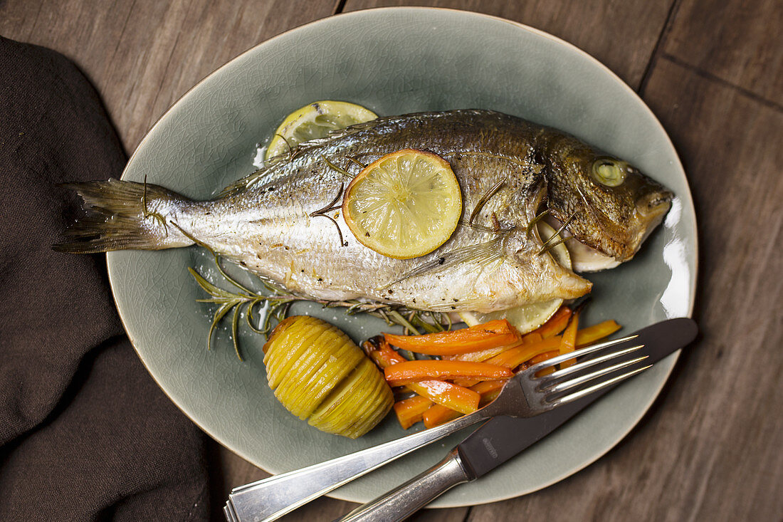 Croatian-style seabream (cooked in olive oil and white wine) with duchesse potatoes and oven-roasted carrots