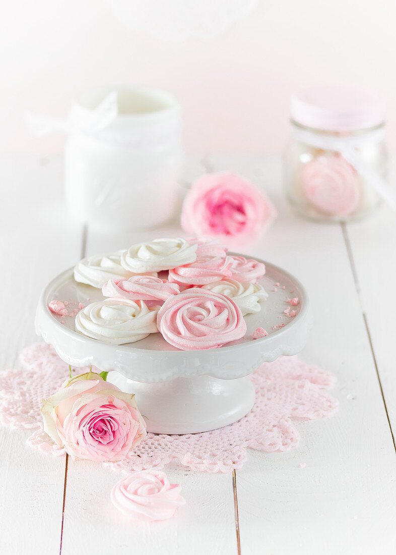 Meringue rose on a cake stand