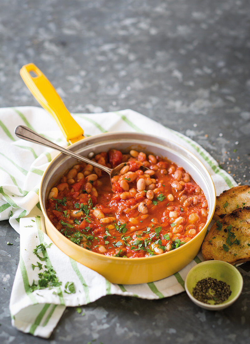 Tuscan tomato-bean bake with herb bruschetta