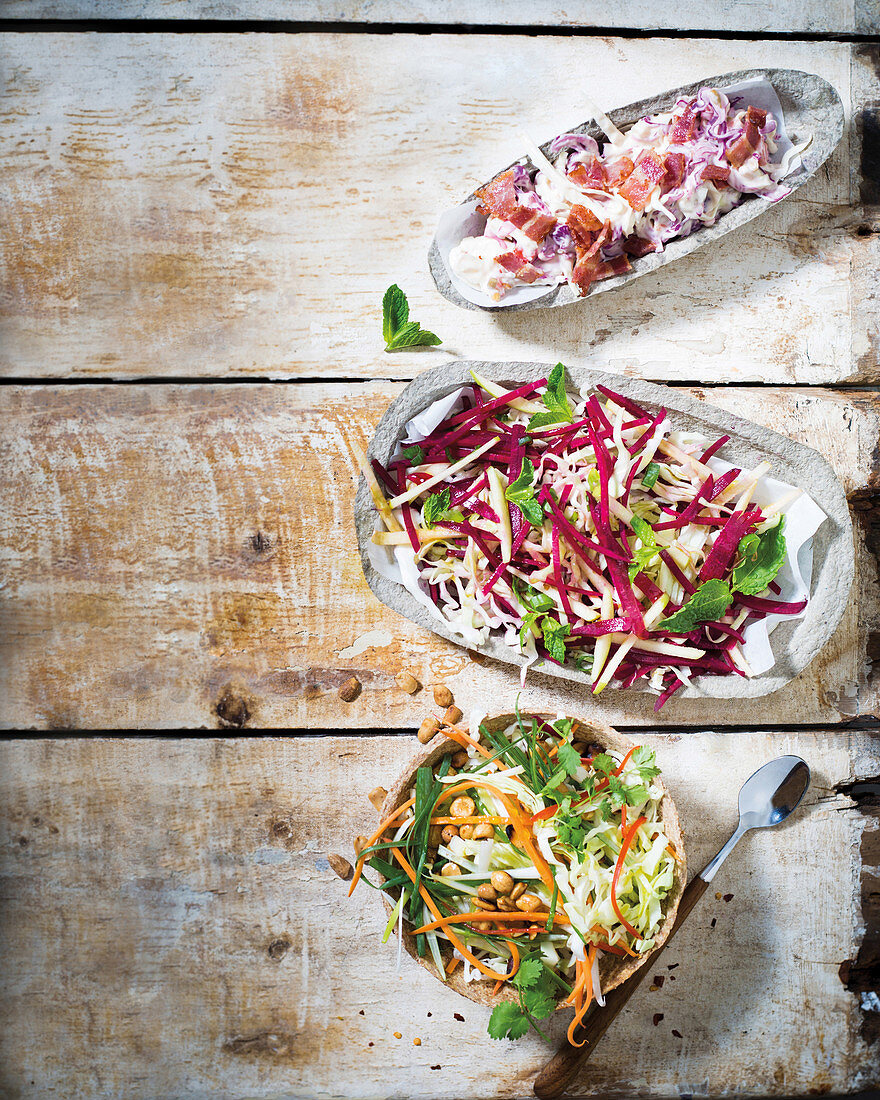 Creamy Mustard and bacon slaw, Apple, beetroot and mint slaw and Asian slaw