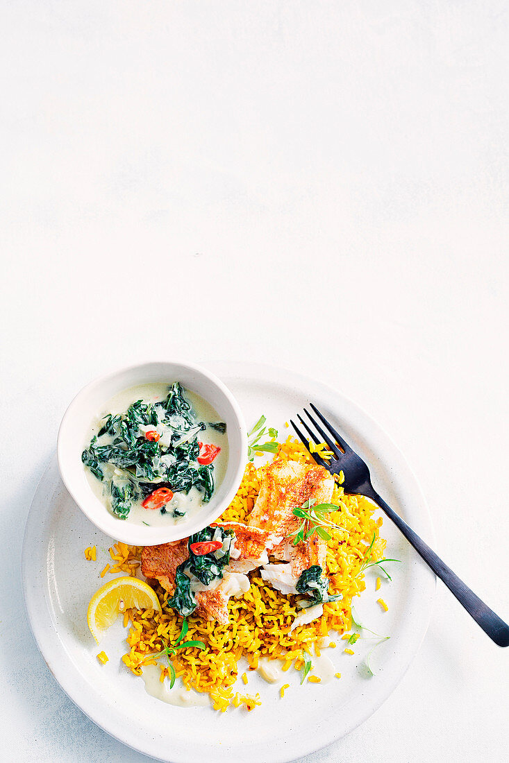 Fish with quick turmeric rice and coconut silverbeat