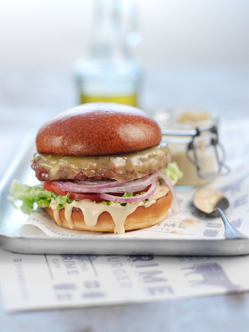 A truffle burger with red onions