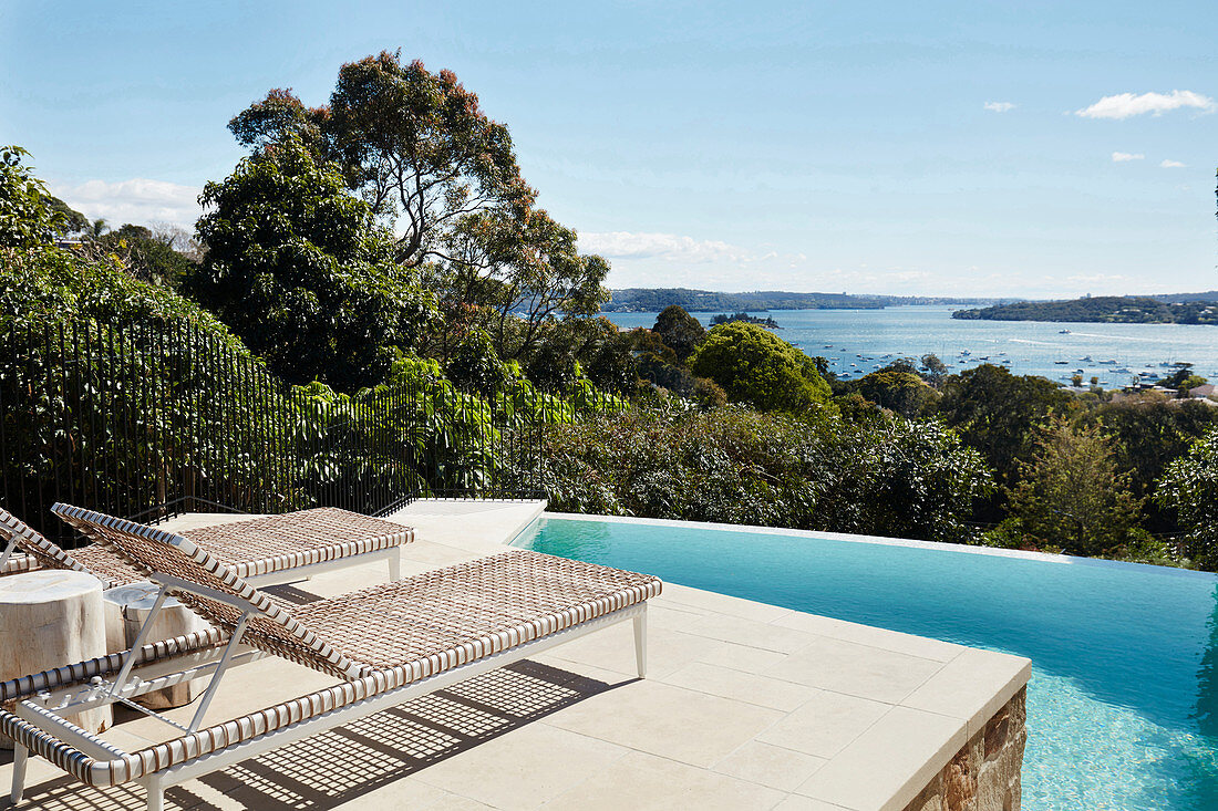 Sun beds by the pool, sea view